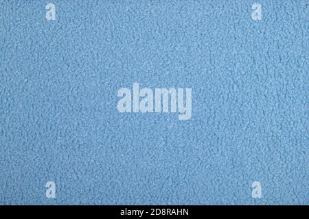 blue Abstract Artificial texture fur fabric, background, closeup. Fluffy material backdrop, kids toys faux fur. Stock Photo