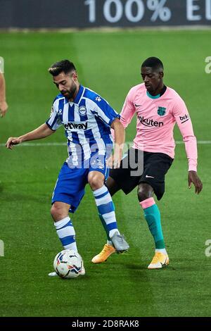 Ruben Duarte of CD Alaves and Ousmane Dembele of FC Barcelona during the Spanish championship La Liga football match between CD Alaves and FC Barcel C Stock Photo