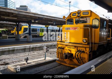 Diesel electric locomotive and electric multiple unit trains at Wellington railway station, North Island, New Zealand Stock Photo