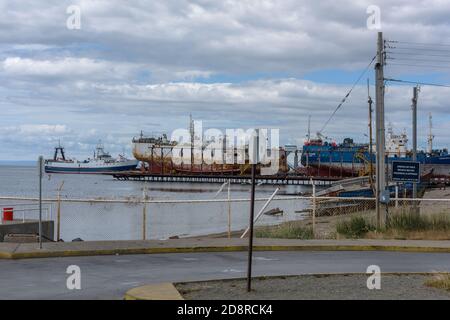 ships in a shipyard in the port of Punta Delgada, Chile Stock Photo