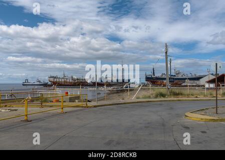 ships in a shipyard in the port of Punta Delgada, Chile Stock Photo