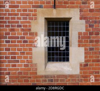 Architectural feature showing old fashioned window embedded in brick wall Stock Photo