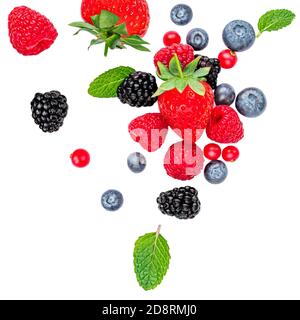 Flying Fresh berries isolated on white background, top view. Strawberry, Raspberry, Blueberry and Mint leaf, flat lay Stock Photo