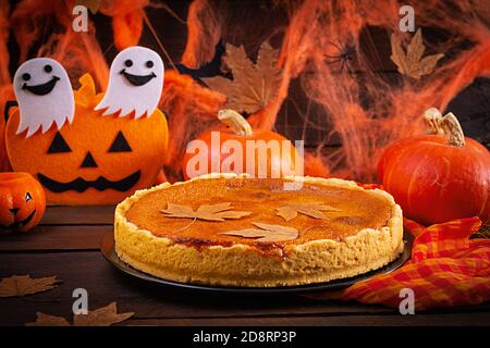 Delicious pumpkin tart. Homemade pie for Thanksgiving Day or Halloween. Autumn concept Stock Photo