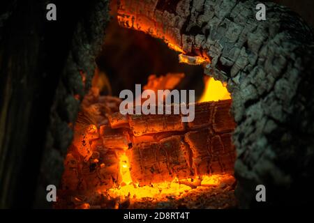 Burning wood smoldering wood smoldering log. Burning logs burned in the ...