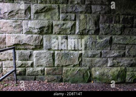 Heavy duty stone built bridge wall Stock Photo
