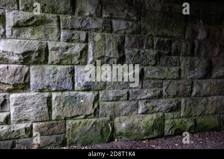 Heavy duty stone built bridge wall Stock Photo