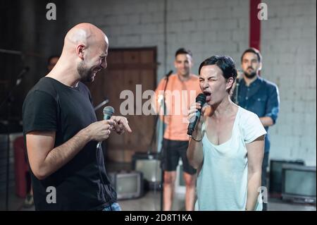 Rehearsal at theatre. Actors preparing for a role during the rehearsal of the play on the new performance for public. Behind the scene Stock Photo