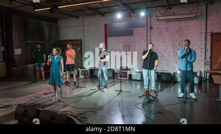 Rehearsal at theatre. Actors preparing for a role during the rehearsal of the play on the new performance for public. Behind the scene Stock Photo