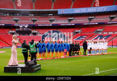 https://l450v.alamy.com/450v/2d8t3dx/players-line-up-on-the-pitch-as-emily-haig-left-sings-the-national-anthem-prior-to-the-beginning-of-the-womens-fa-cup-final-at-wembley-stadium-london-2d8t3dx.jpg