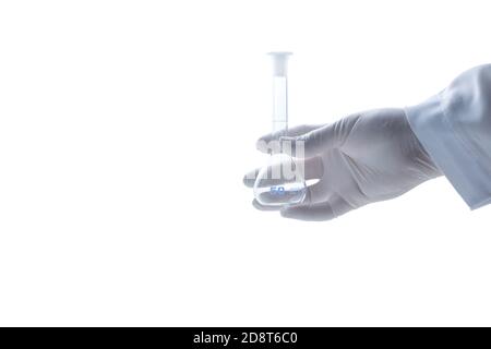 hand scientist wearing rubber gloves and hold Erlenmeyer flasks isolated on white background and coppy space, Chemical laboratory glassware and Scienc Stock Photo