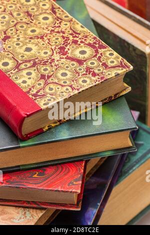 Stack of old books with ancient bindings Stock Photo