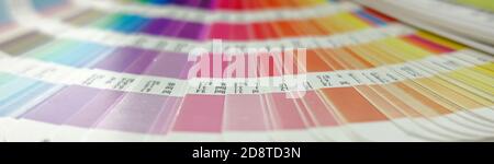 Horizontal image of color guide palette. Choosing colors from catalog samples for printing proofing. Concept of color management in the print producti Stock Photo