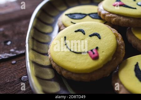 Closeup of cookies with decorated funny smiley faces Stock Photo