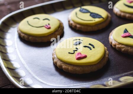 Closeup of cookies with decorated funny smiley faces Stock Photo