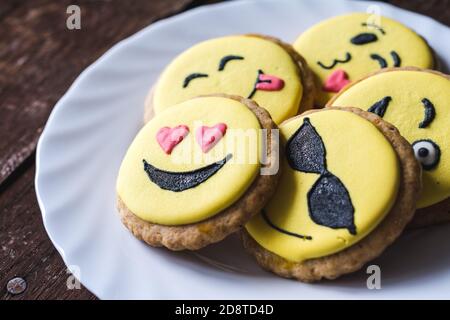 Closeup of cookies with decorated funny smiley faces Stock Photo