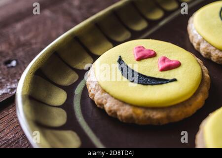 Closeup of cookies with decorated funny smiley faces Stock Photo