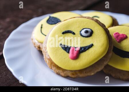 Closeup of cookies with decorated funny smiley faces Stock Photo