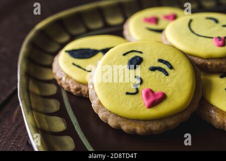 Closeup of cookies with decorated funny smiley faces Stock Photo