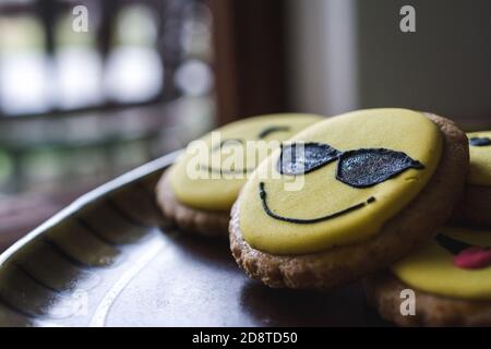 Closeup of cookies with decorated funny smiley faces Stock Photo