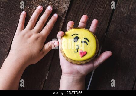 Closeup of cookies with decorated funny smiley faces Stock Photo