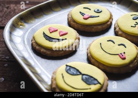 Closeup of cookies with decorated funny smiley faces Stock Photo