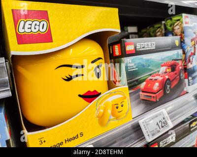 Puilboreau, France - October 14, 2020: Selected Focus on Head figurine Lego displayed in a supermarket shelf Stock Photo