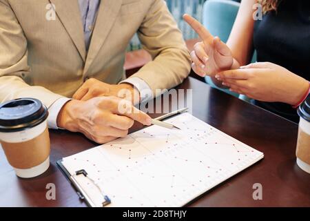 Business people analyzing chart Stock Photo