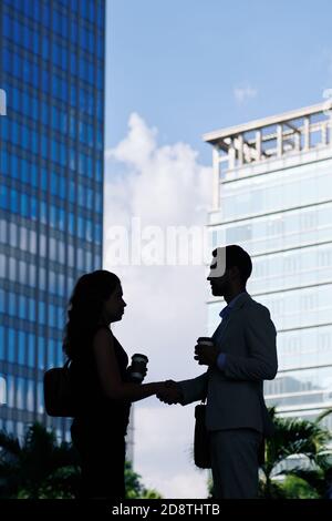 Business partners shaking hands Stock Photo