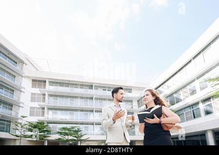 Colleagues discussing work Stock Photo