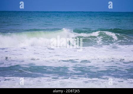 Powerful blue ocean wave with perfect breaking natural background Stock Photo