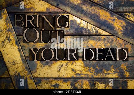 Bring Out Your Dead text message on vintage textured copper bar background Stock Photo