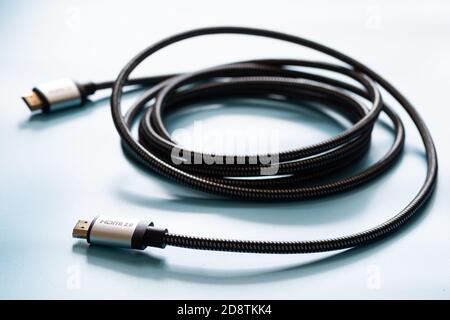 HDMI Cable connector and copy space on blue background color mood and tone style Stock Photo