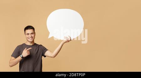 Pointing finger on empty blank say cloud, speech bubble Stock Photo