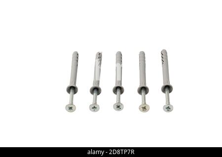 Macro view of plastic dowel screws isolated on white background. Stock Photo