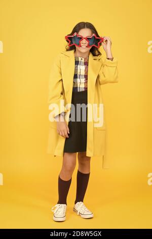 Dreaming about fame. Become popular. Celebrity child. Star concept. Fame and popularity. Cheerful girl wear eyeglasses. Cool kid celebrity. Popular schoolgirl. Carnival costume famous celebrity. Stock Photo