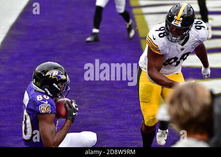 Baltimore, United States. 01st Nov, 2020. Baltimore Ravens quarterback  Lamar Jackson (8) is stopped by Pittsburgh Steelers linebacker Vince  Williams (98) on the 1 yard line during the first half at M&T