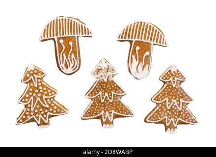 Cute Christmas decoration in mushroom or tree shape. Set of gingerbread cookies painted by sweet icing. Decorated Xmas pastry. Czech cuisine. Top view. Stock Photo