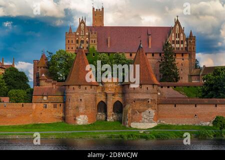 The upper castle and massive towers of the gate of the castle Malbork (Marienburg). Poland Stock Photo