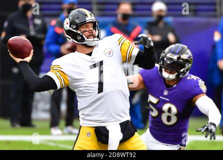 Cleveland Browns punter Jamie Gillan (7) gets stripped of the ball while  faking a punt as Baltimore Ravens linebacker L.J. Fort (58) and linebacker  Otaro Alaka (50) recover the fumble during the