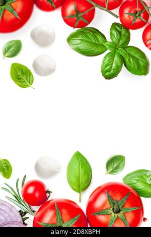 Mozzarella,  basil leaf, rosemary and tomatoes  isolated  on white background.Creative layout made of fresh vegetables. Flat lay. Top view Stock Photo