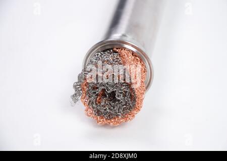 Image of metal rolled grid filter in iron pipe Stock Photo