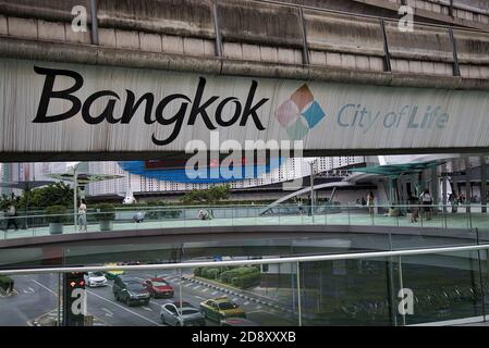 This unique photo shows a bridge in the middle of the capital of thailand that is labeled bangkok citiy of life Stock Photo