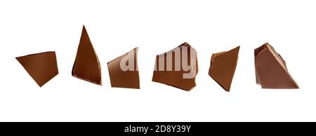 Chocolate pieces and shavings isolated on white background. Chunks of dark chocolate falling close up Stock Photo
