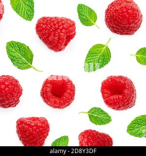 Summer  pattern made  of  Raspberry and mint leves isolated on white background. Flying mixed Raspberries,  flat lay. Top view Stock Photo