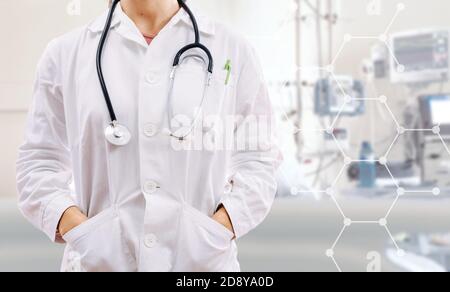 CONCEPTUAL PHOTOGRAPH OF DOCTOR WITH ICONS RELATED TO HEALTH AND MEDICINE Stock Photo