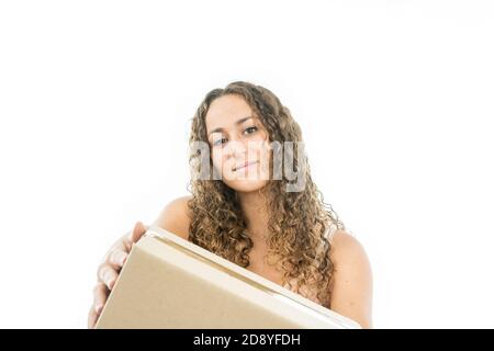 Girl delivering a box of cardboard to the delivery boy Stock Photo