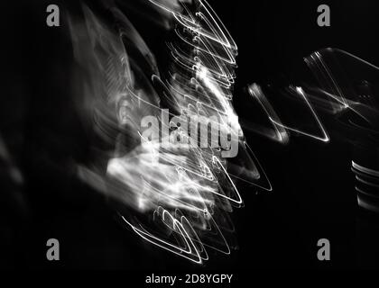 Jazz music concept. Saxophone player performing on stage. Sax player going crazy. Abstract motion blurred image. Stock Photo