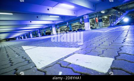 Hamburg, Germany. 02nd Nov, 2020. Only a few cars can be seen in the parking garage at Hamburg Airport. A four-week partial lockdown has begun throughout Germany to slow down the spread of the corona virus. Credit: Christian Charisius/dpa/Alamy Live News Stock Photo