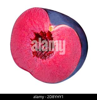 Plum fruits isolated on white background. Fresh half of blue plums Macro Stock Photo